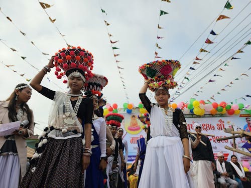 Women Carrying Baskets 