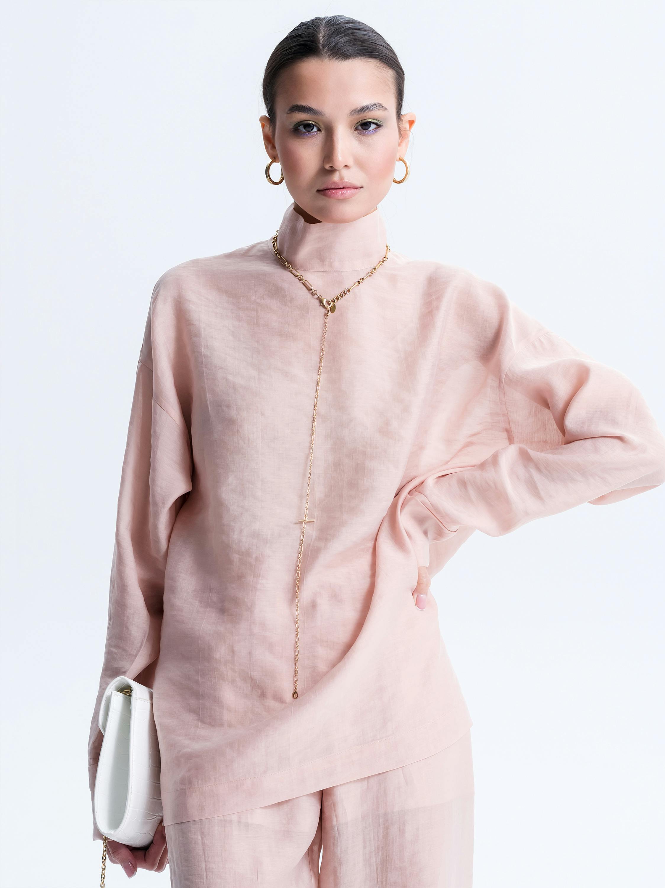 Woman Posing in Pink Outfit
