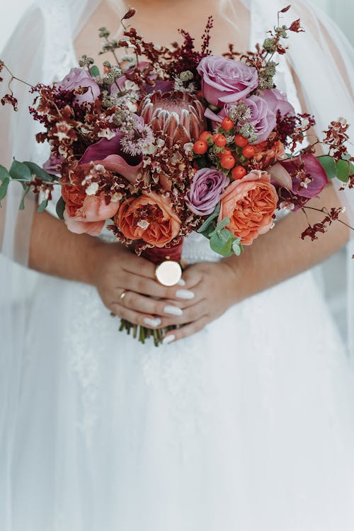 Bride Holding Bouquet in Hands