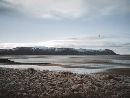 Panorama of an Ocean Coast with Distant Cliffs, Llandudno, Wales, UK