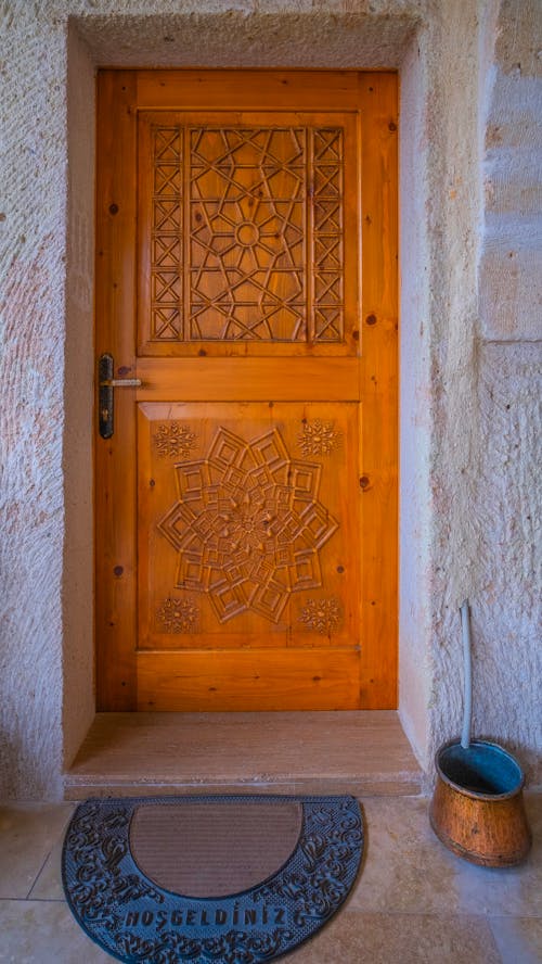 Door with Carved Patterns at the Entrance to an Old Building 