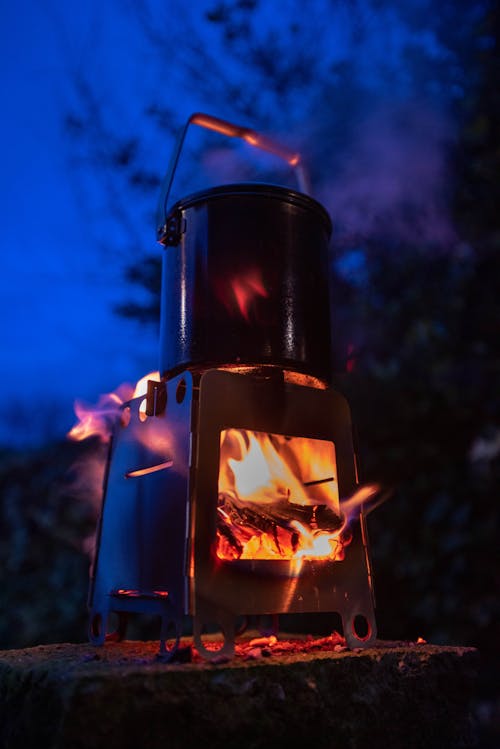 Camping wood stove with pot