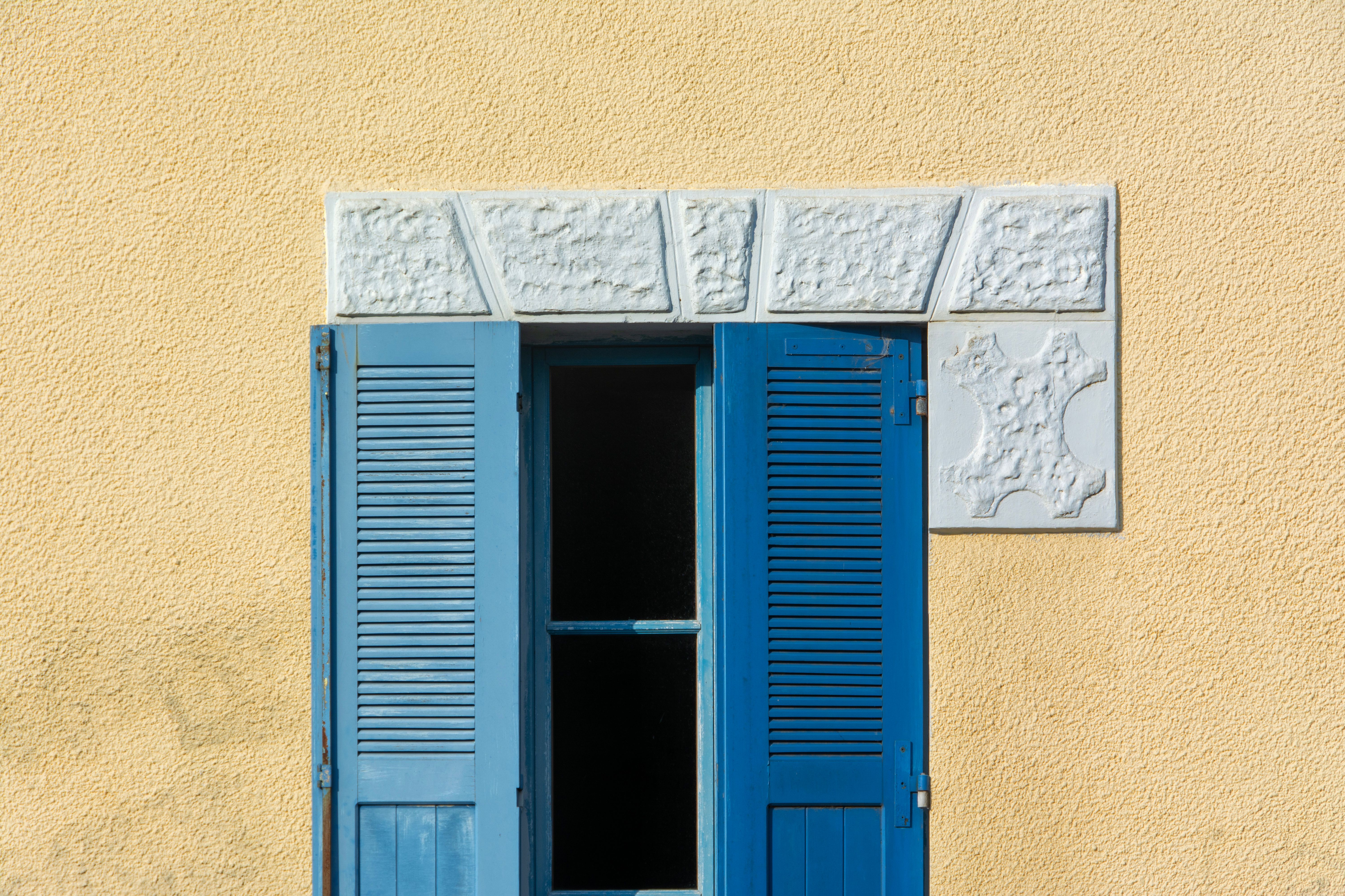 Exterior Painting in Plaistow — a decorator at work mid-project