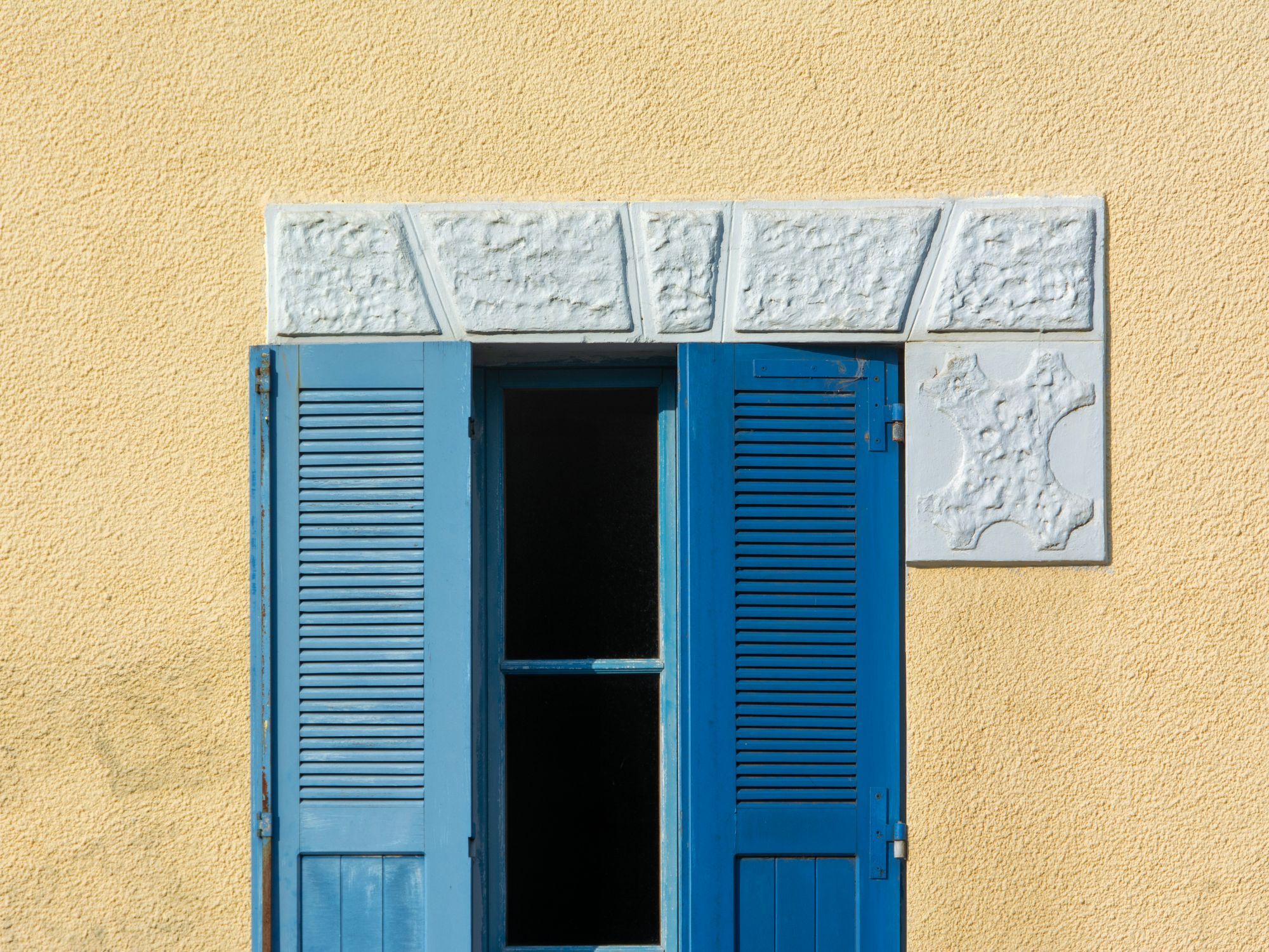 Exterior Painting in Tolworth, Kingston upon Thames — painter refreshing a house exterior in weatherproof paint