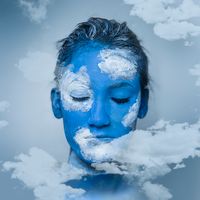 Portrait with blue face paint — Isabella Mariana on Pexels