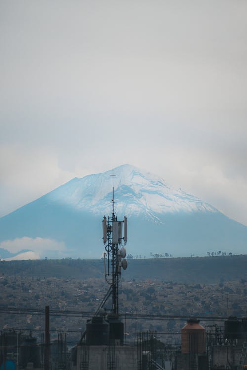 View of an Antenna and a Volcano in the Background 