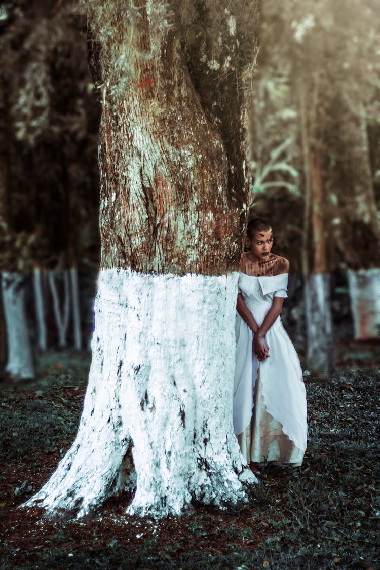 Woman Beside Tree