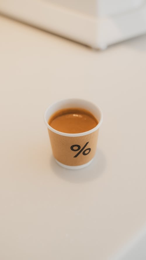 Close-up of Coffee in a Paper Cup 