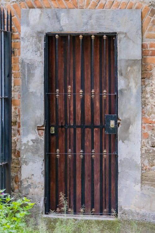 Wooden Door in a Brick Building 