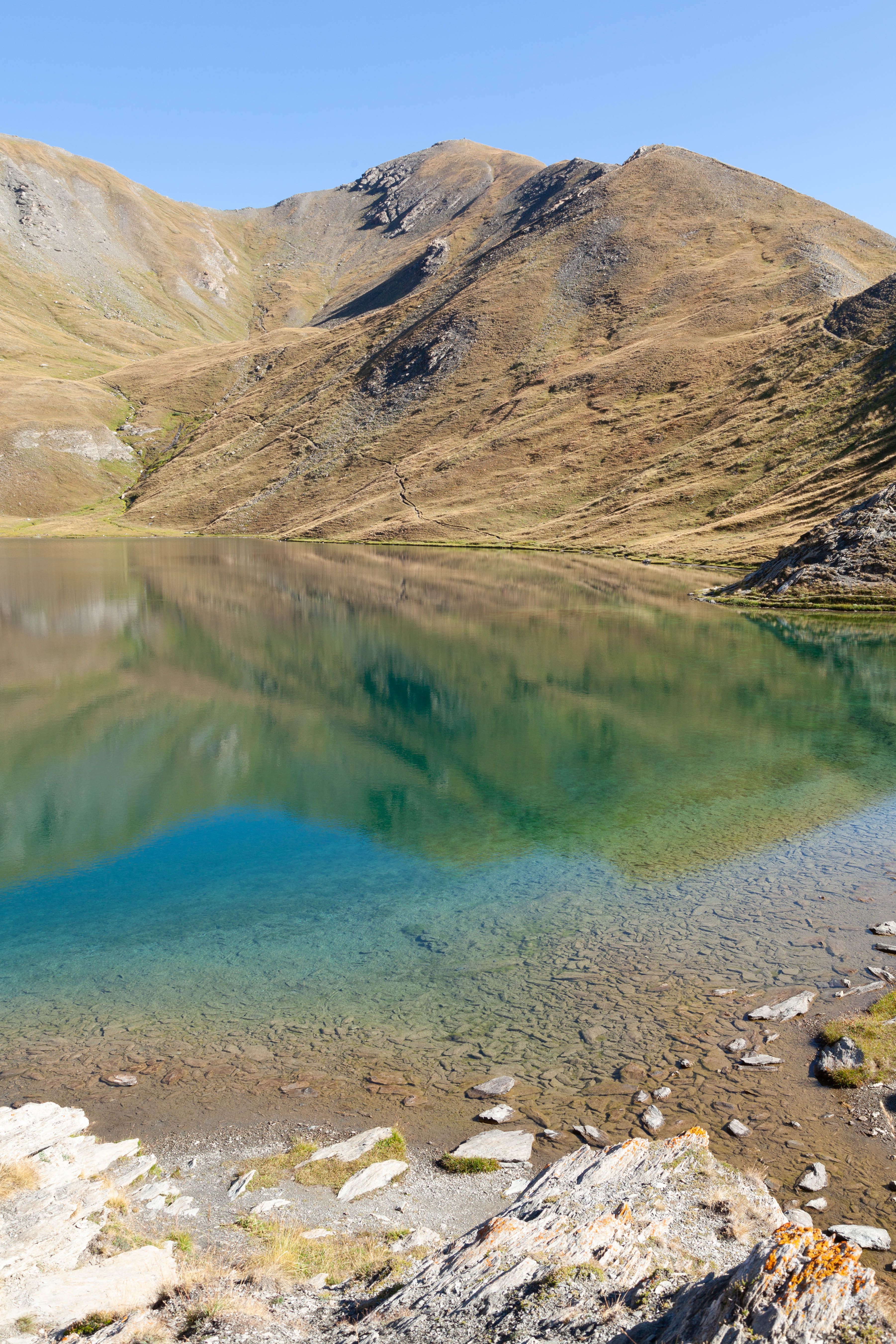 Reflection in Alpine Lake · Free Stock Photo