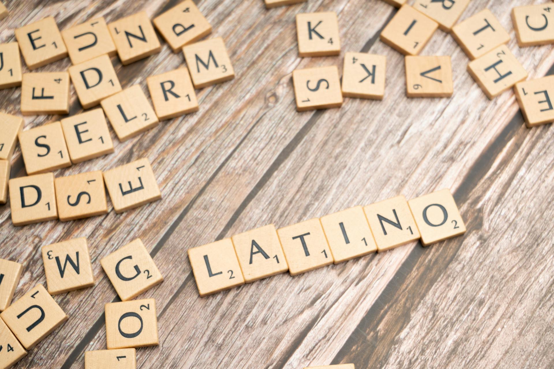 The word latino is spelled out in scrabble letters