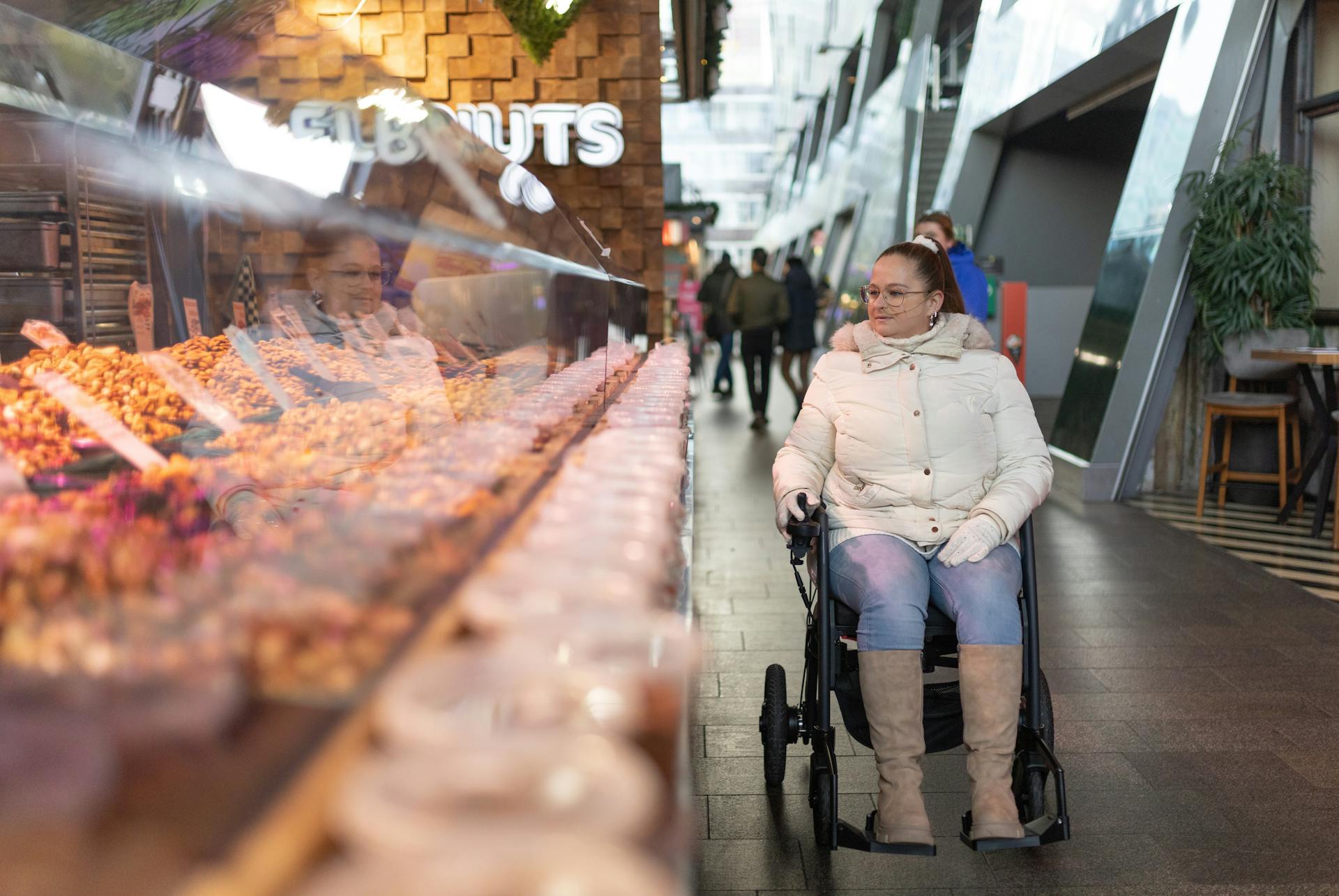 Woman at Cafe at Shopping Mall