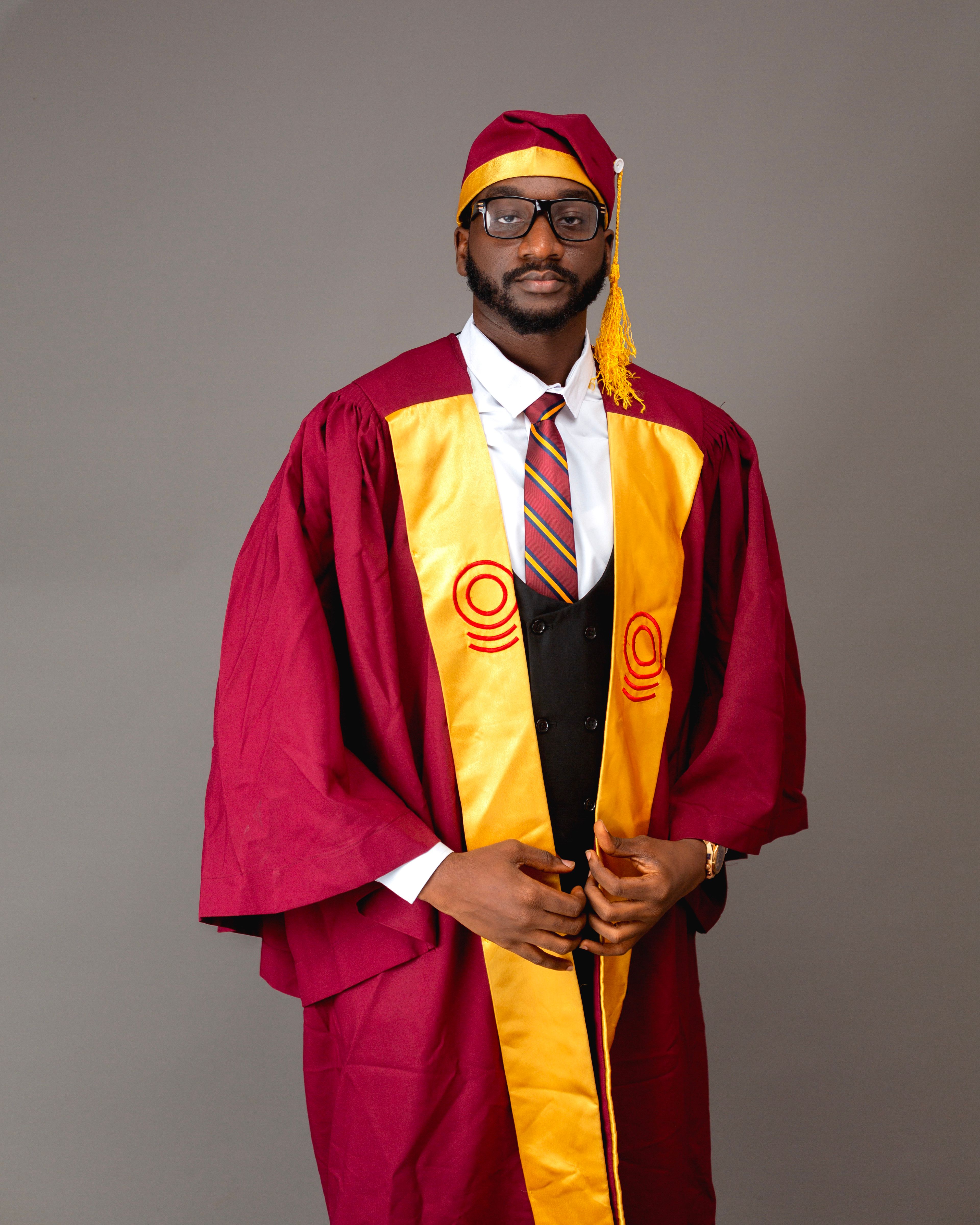 Portrait of Man in Graduate Gown  Free Stock Photo