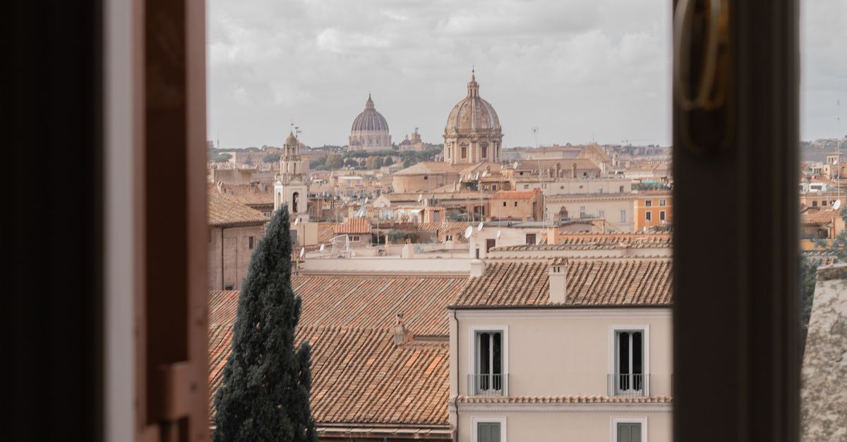 Window View Rome Roofs of Buildings in Rome behind Window · Free Stock Photo