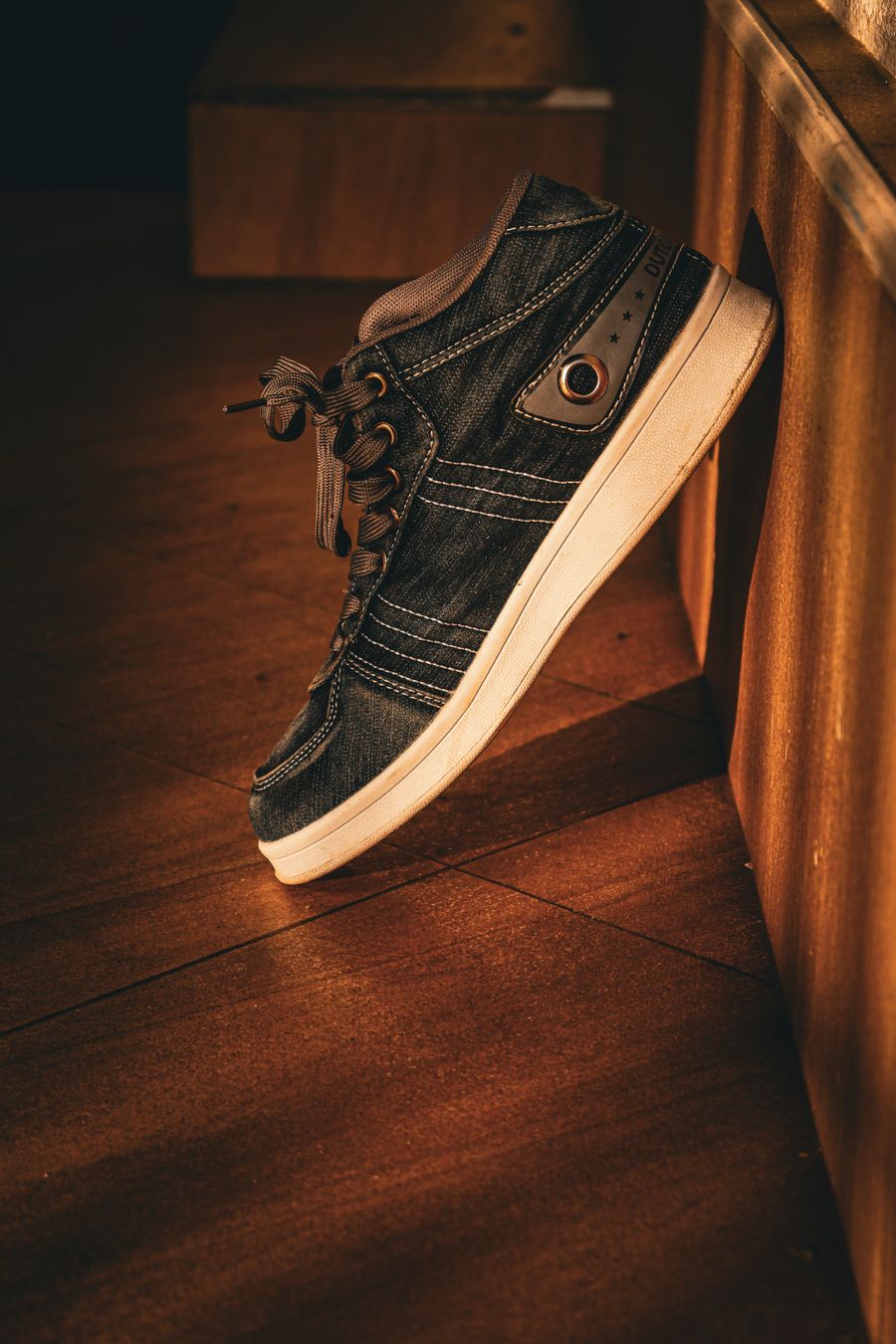 Denim sneaker in warm light