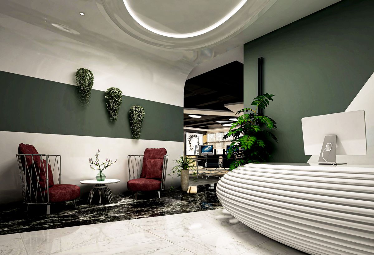An elegant modern reception area with seating and greenery