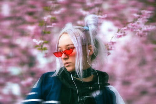 Woman with Dyed Hair and in Red Eyeglasses