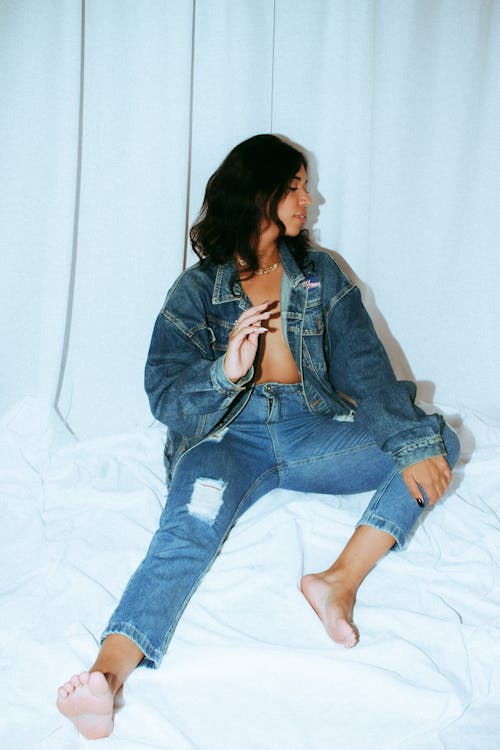 Model Sitting in Jean Jacket