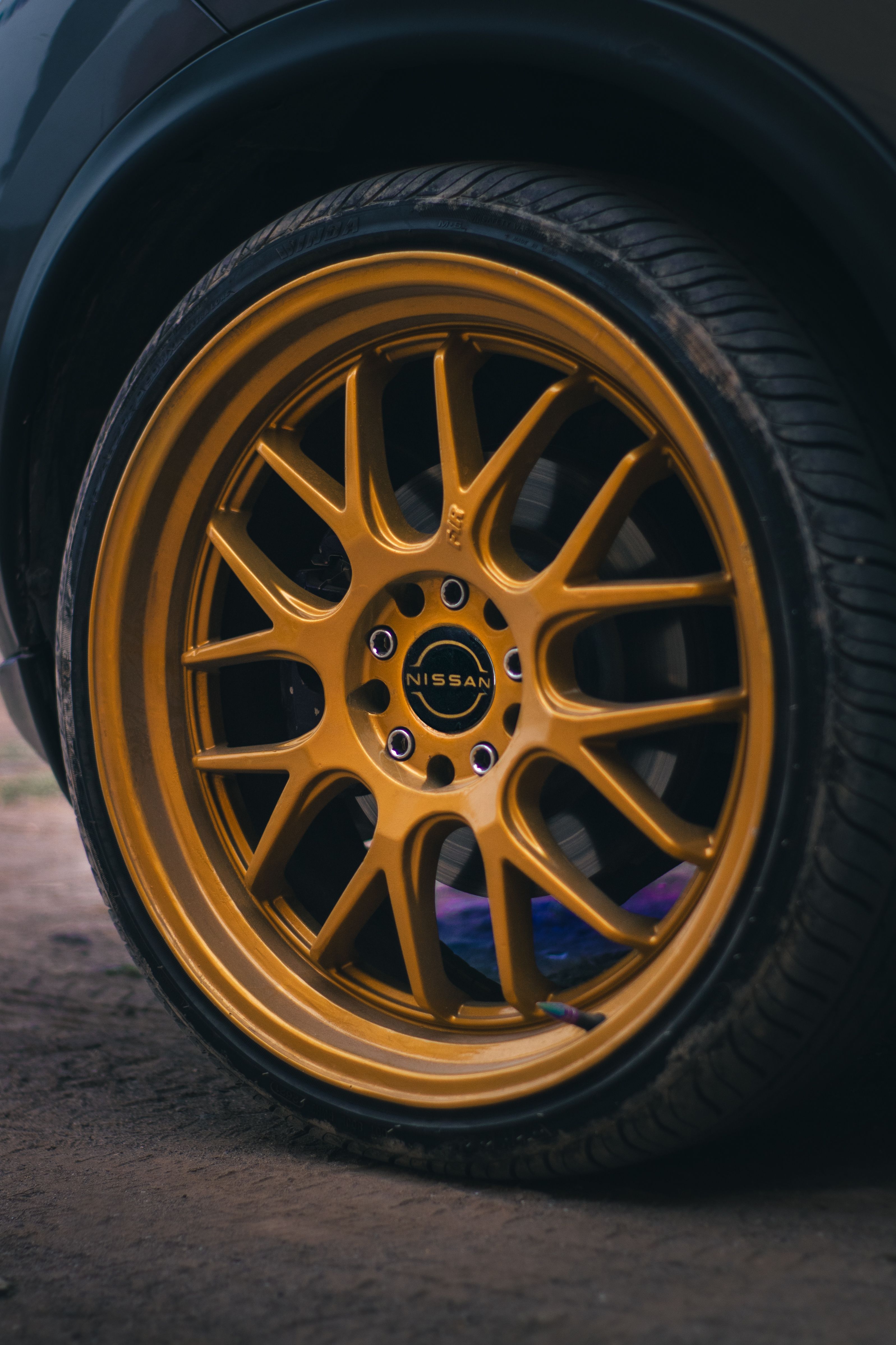 A yellow wheel on a car · Free Stock Photo