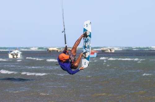 Kitesurfer in Midair Over the Sea