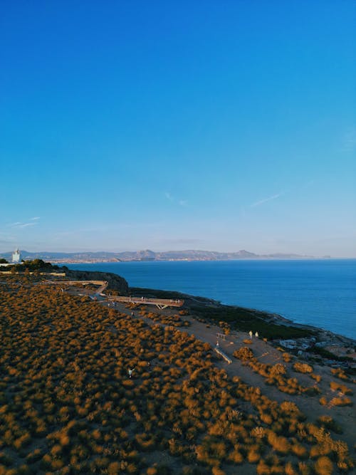 드론으로 찍은 사진, 맑은 하늘, 바다의 무료 스톡 사진