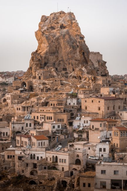 Explore the historic rock formations and traditional architecture of Ortahisar, a unique town in Cappadocia, Turkey.