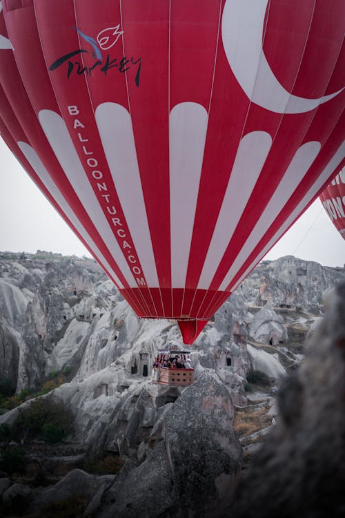 Foto stok gratis balon udara, bendera, cappadocia