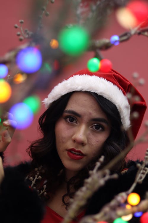 Portrait of a Woman in Santa Claus Hat