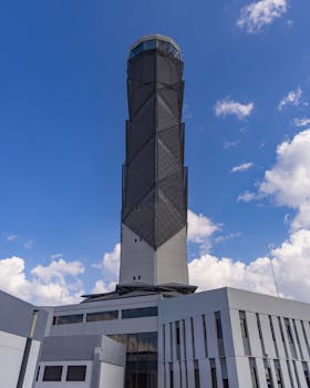 Modern air traffic control tower at Felipe Angeles Airport, Mexico City.