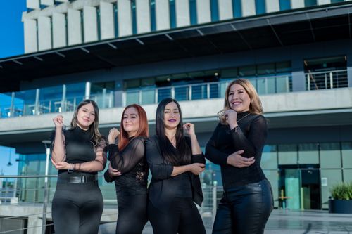 Free Group of confident women leaders posing outdoors in Juárez, Mexico, showcasing empowerment. Stock Photo