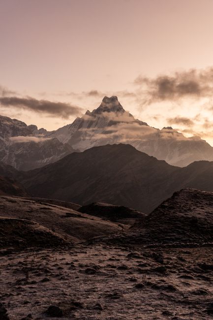 A stunning view of a mountain range during twilight, showcasing natural beauty and tranquility.