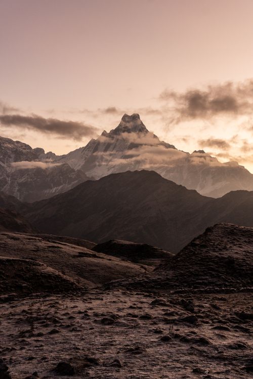 Free A stunning view of a mountain range during twilight, showcasing natural beauty and tranquility. Stock Photo