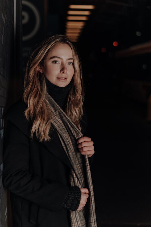 Blonde Woman in Coat and Scarf