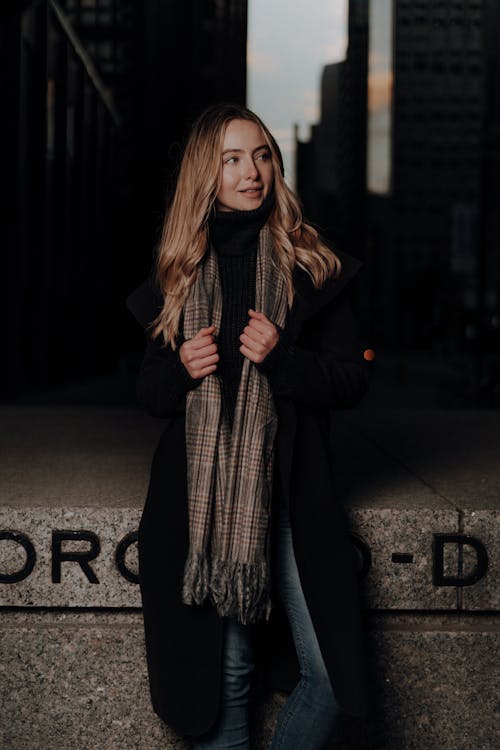 Smiling Blonde Woman in Scarf