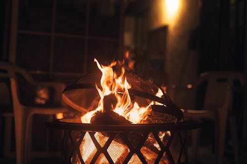 Fire Burning in Basket at Night