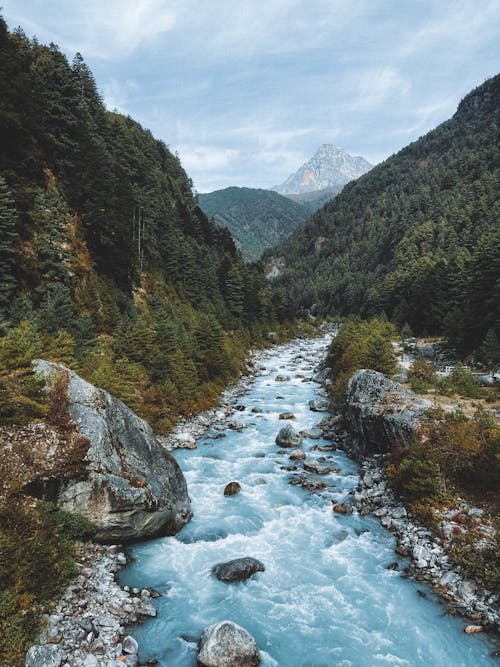 View of a River Flowing in a Mountain Valley