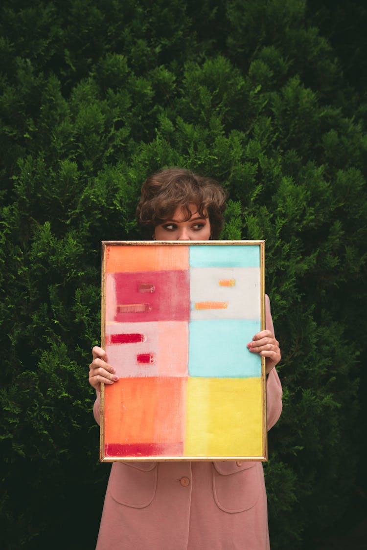 Woman Holding Frame