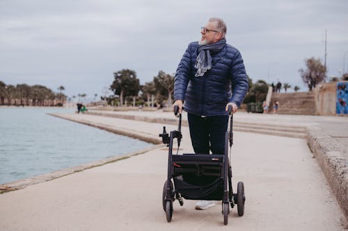 Elderly Man on a Cart by the Shore 