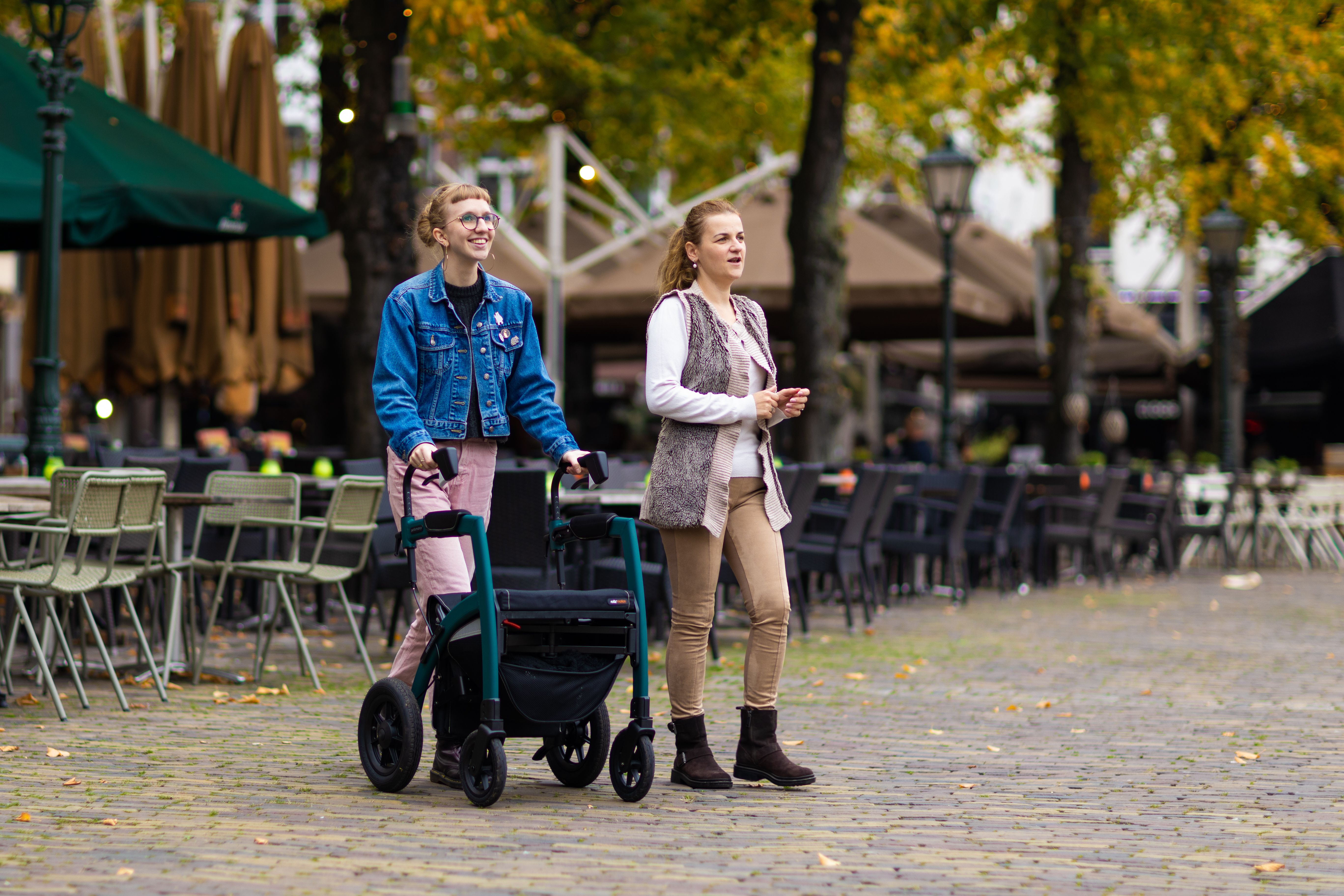 Smiling Women with Walker in Old Town · Free Stock Photo