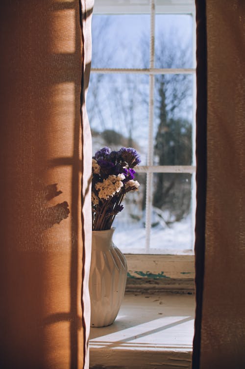 Bouquet of Flowers in a Vase by the Window 