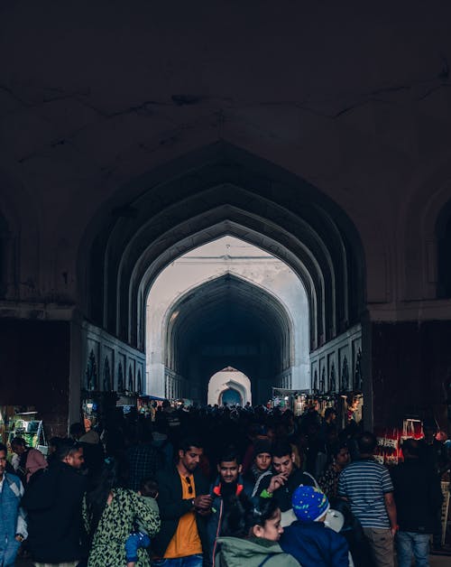 People Under an Arch in Mosque 