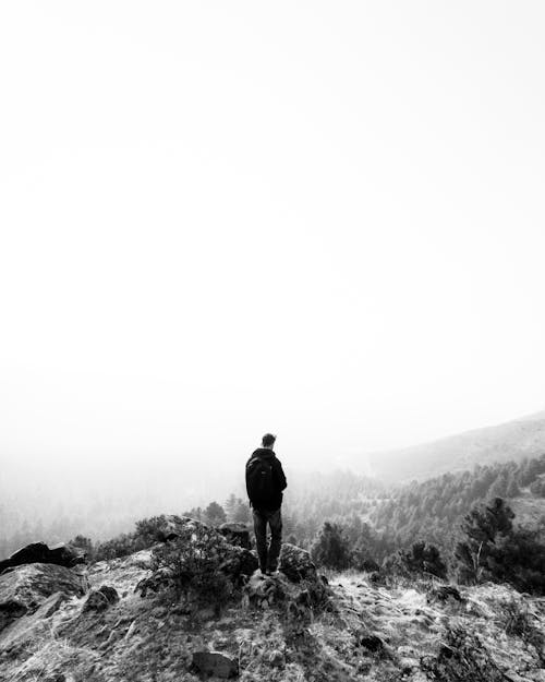 Alone Man Standing on Hill