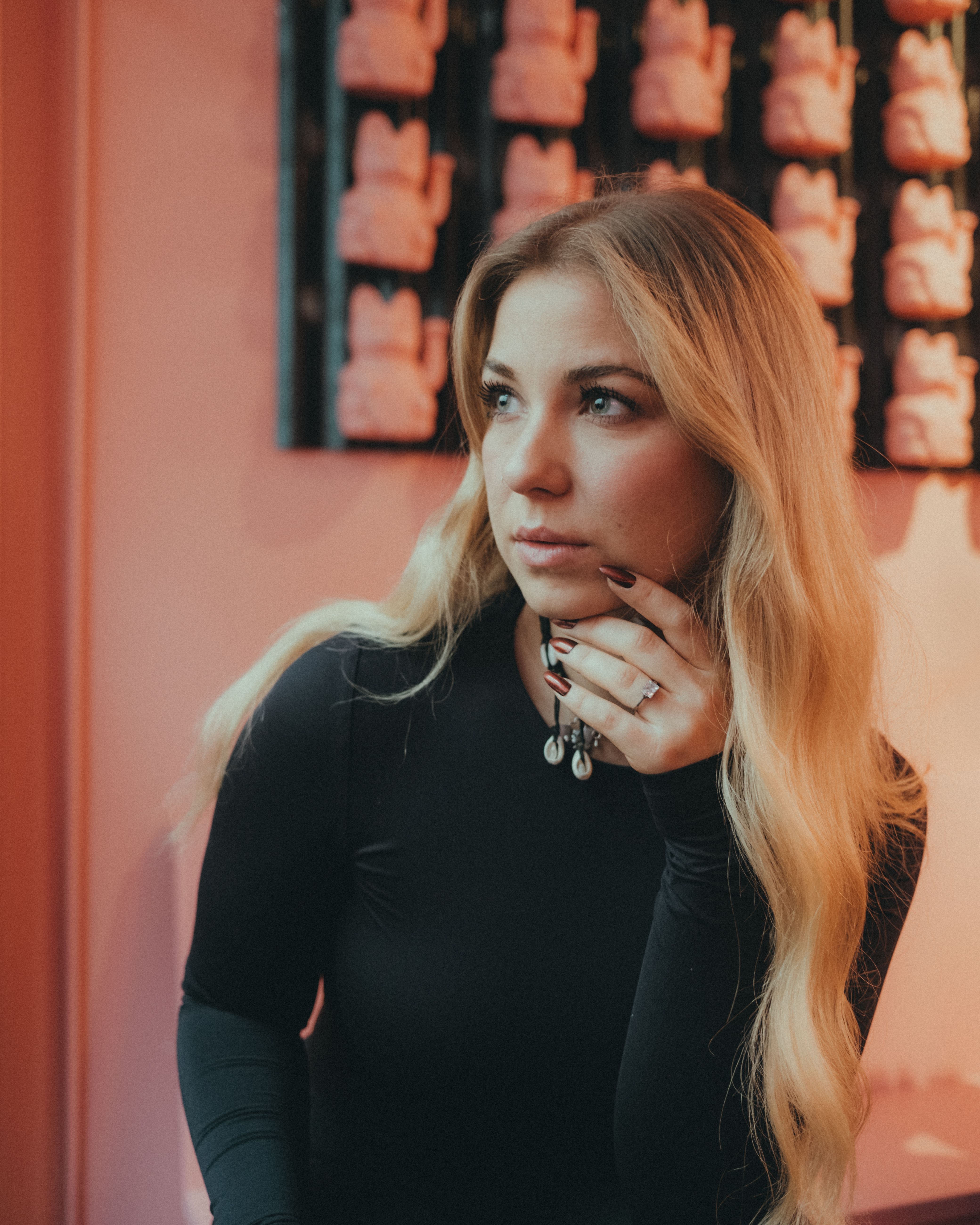 Portrait of a Young Woman in a Black Blouse · Free Stock Photo