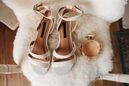 White Womens Sandals with a Perfume Bottle