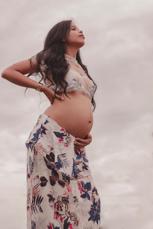 Free Pregnant Woman Wearing Crop Top  Stock Photo