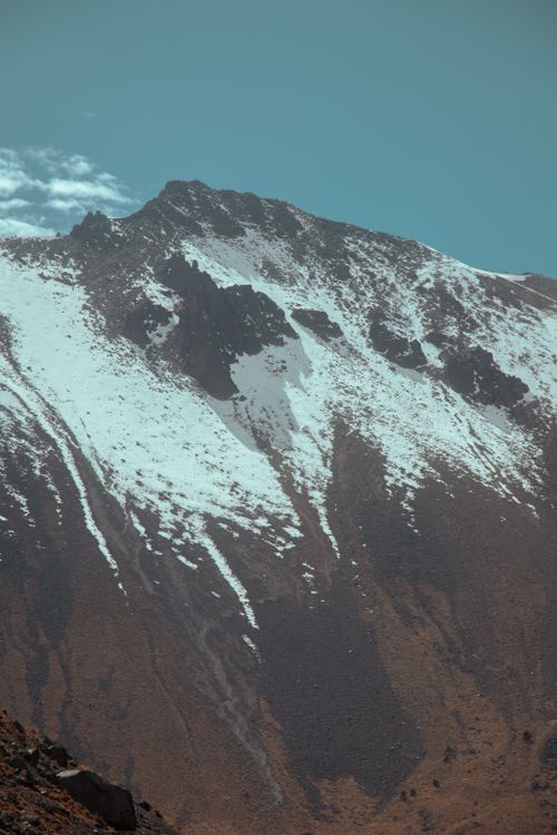 Free Snow-covered peaks of Nevado de Toluca in Mexico, showcasing stunning winter landscape. Stock Photo