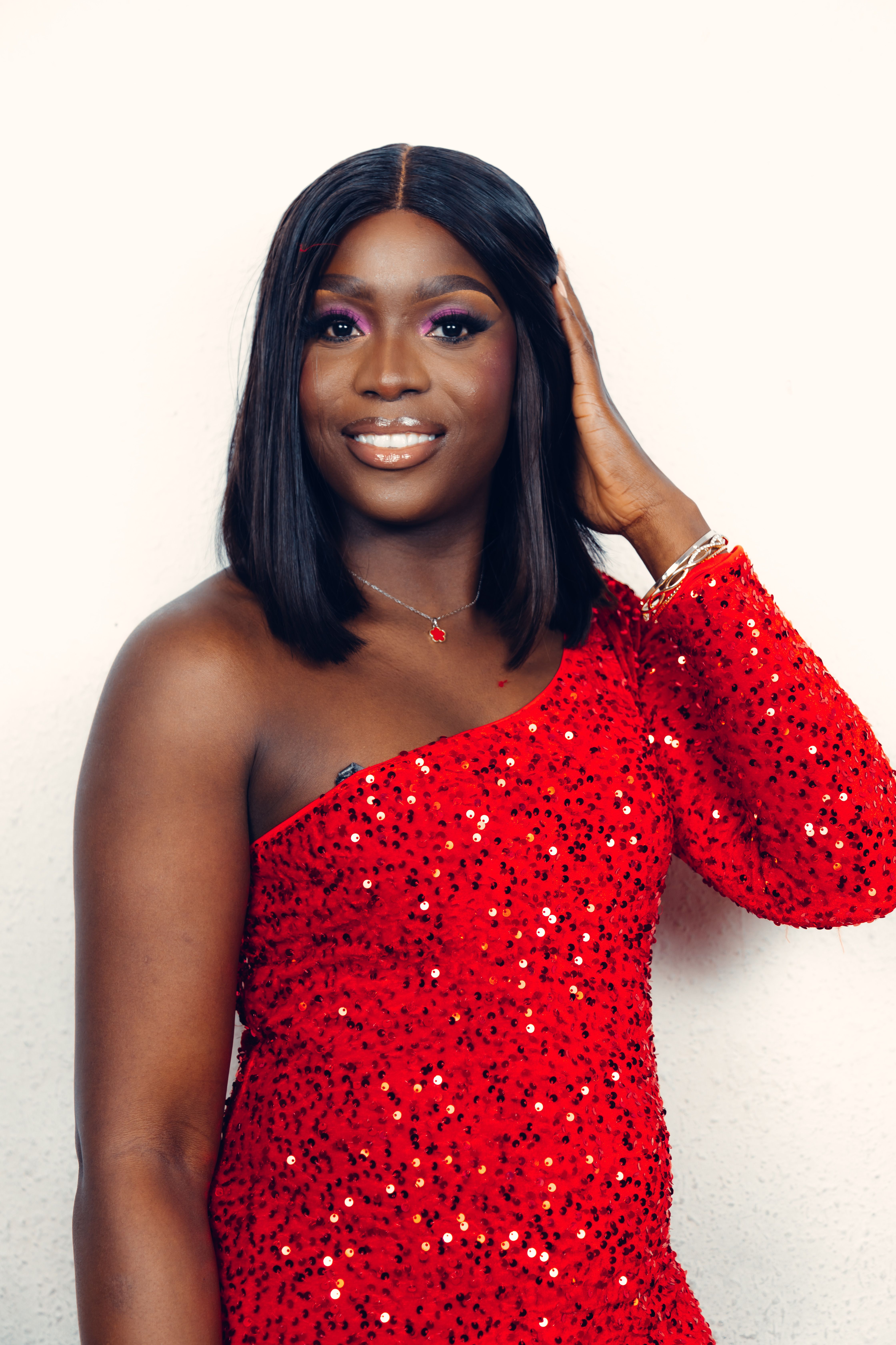 Smiling Woman in Red Dress · Free Stock Photo
