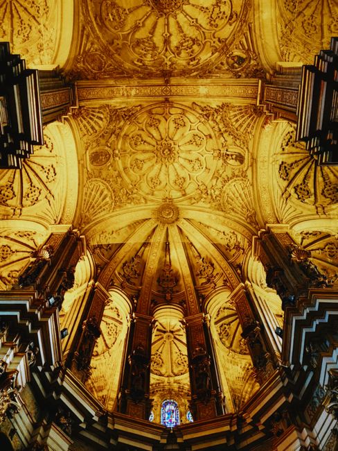 Stunning view of the ornate ceiling inside Malaga Cathedral, Spain.