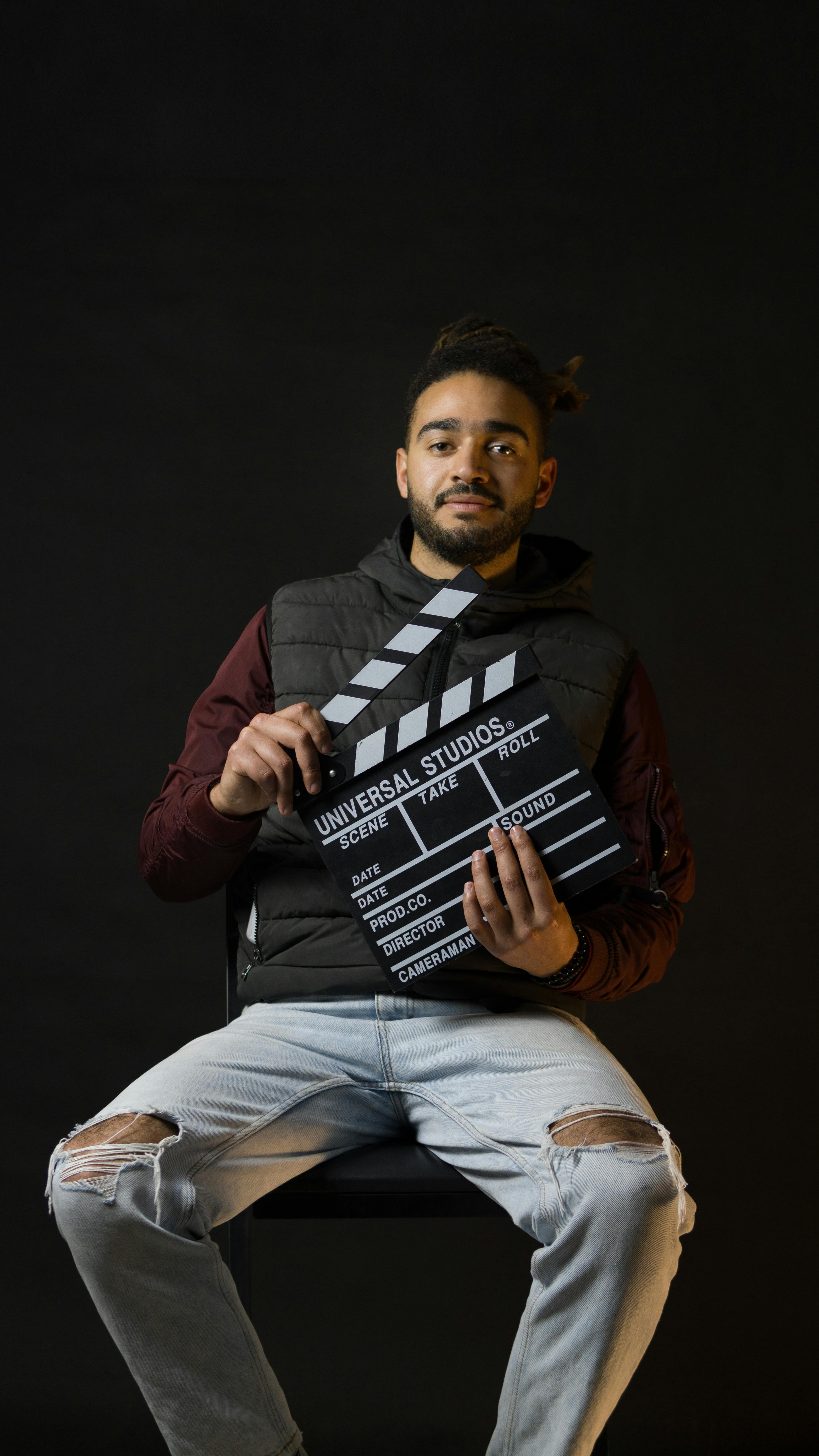 man with clapperboard