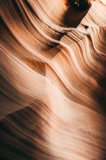 Ethereal sandstone formations in Antelope Canyon, Arizona, showcasing stunning natural artistry.